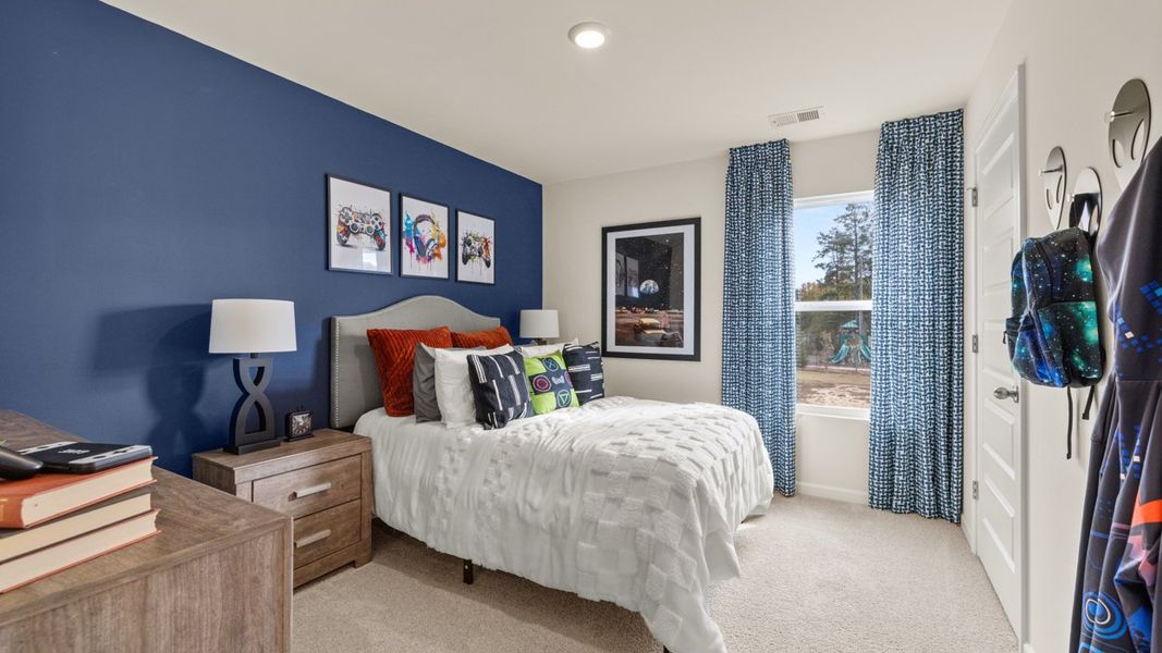 Furnished interior in a model home at Oakchase at Hampton in Hampton (Image 26).