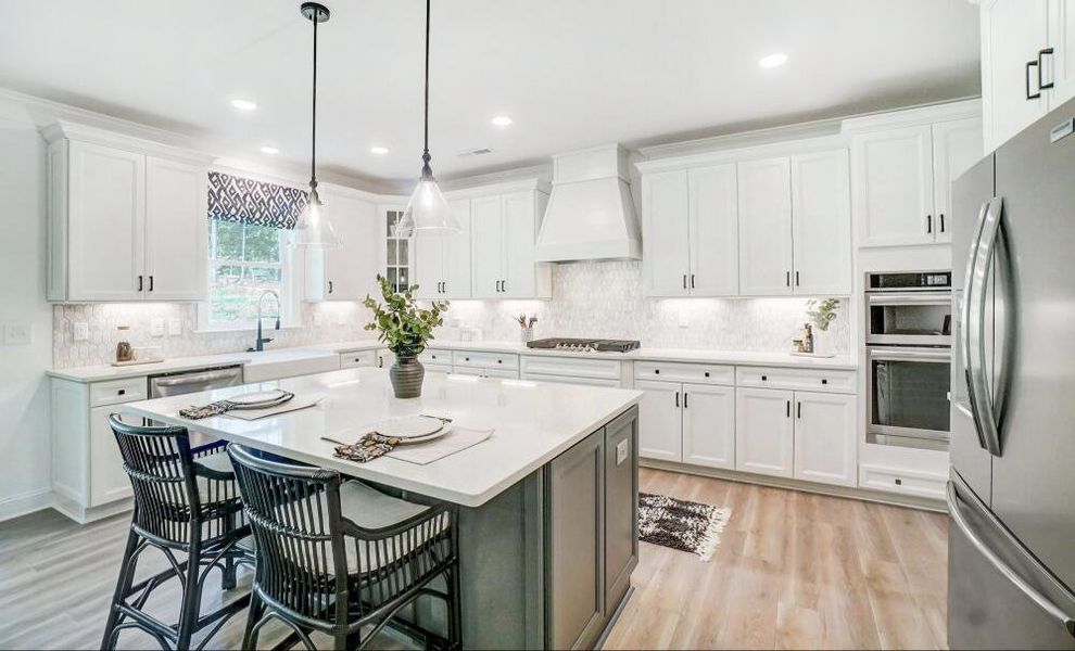 Furnished interior in a model home at Peyton's Creek in Statesville (Image 7).