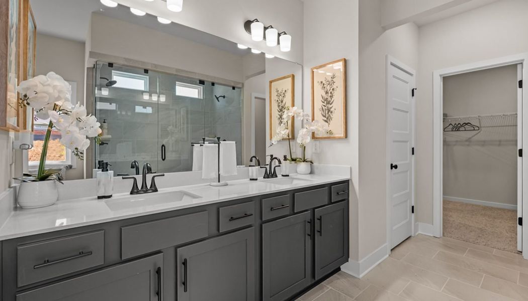 Furnished interior in a model home at Rosewood Lake Preserve in Hoschton (Image 28).