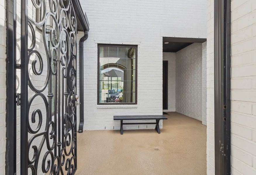 Plan 6020 model courtyard - 2 of 15 Plan 6020 model courtyard - 2 of 15