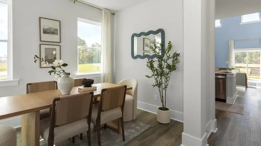 Furnished interior in a model home at The Palms at Indigo Preserve Townhomes in Leland (Image 6).