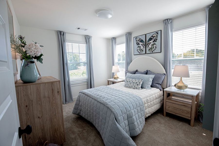 Furnished interior in a model home at The Townhomes at Union Depot in Bartlett (Image 33).