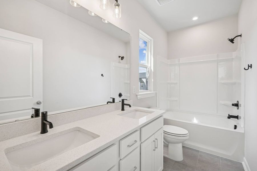 Furnished interior in a model home at Carriages at Chatham Park in Pittsboro (Image 47). Furnished interior in a model home at Carriages at Chatham Park in Pittsboro (Image 47).