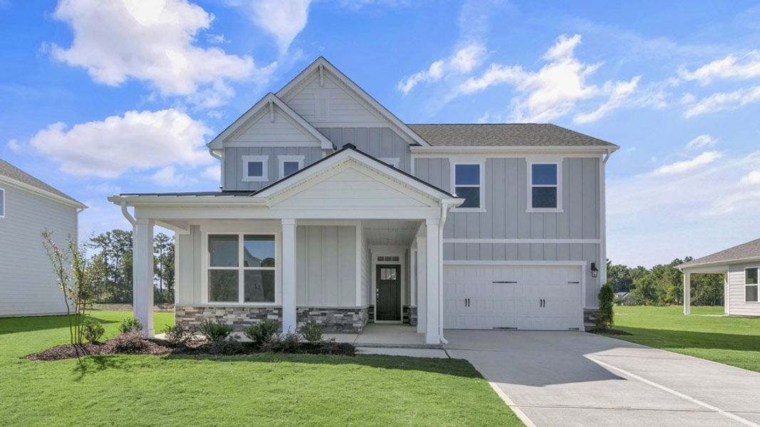 Front exterior of a home in the Eagle Creek community, located in Fuquay Varina, NC (Image 14).
