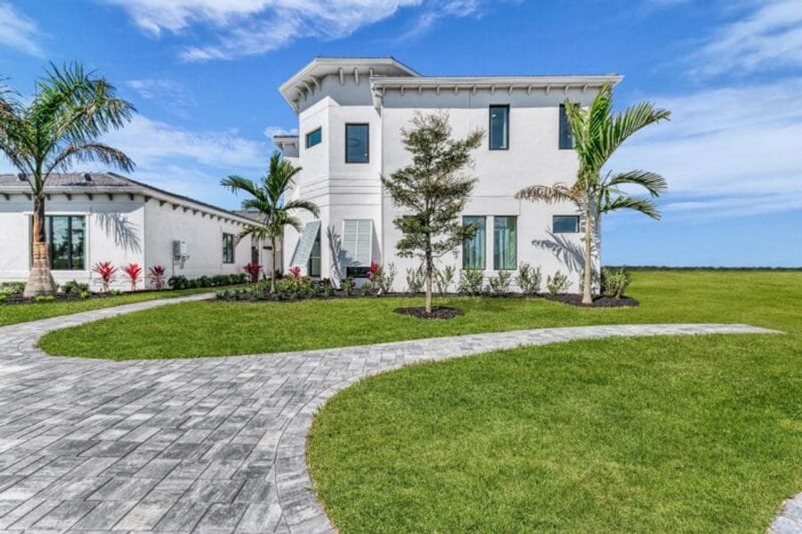 Front exterior of a home in the Aqua community, located in Bradenton, FL (Image 4). Front exterior of a home in the Aqua community, located in Bradenton, FL (Image 4).