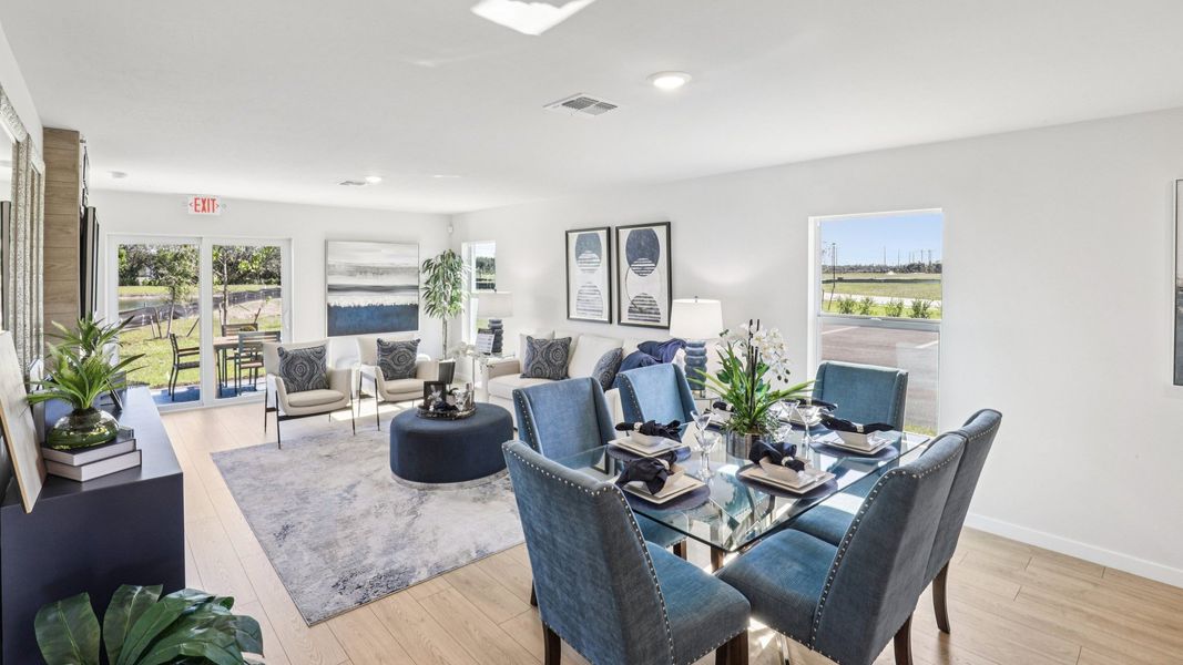Furnished interior in a model home at Asher Park in Lehigh Acres (Image 20).