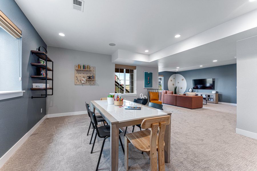 Furnished interior in a model home at Hillside at Crystal Valley Destination Collection in Castle Rock (Image 27).
