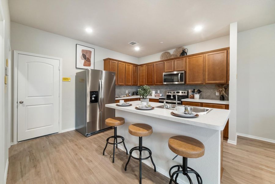 Furnished interior in a model home at Seven Oaks Townhomes in Tomball (Image 19).