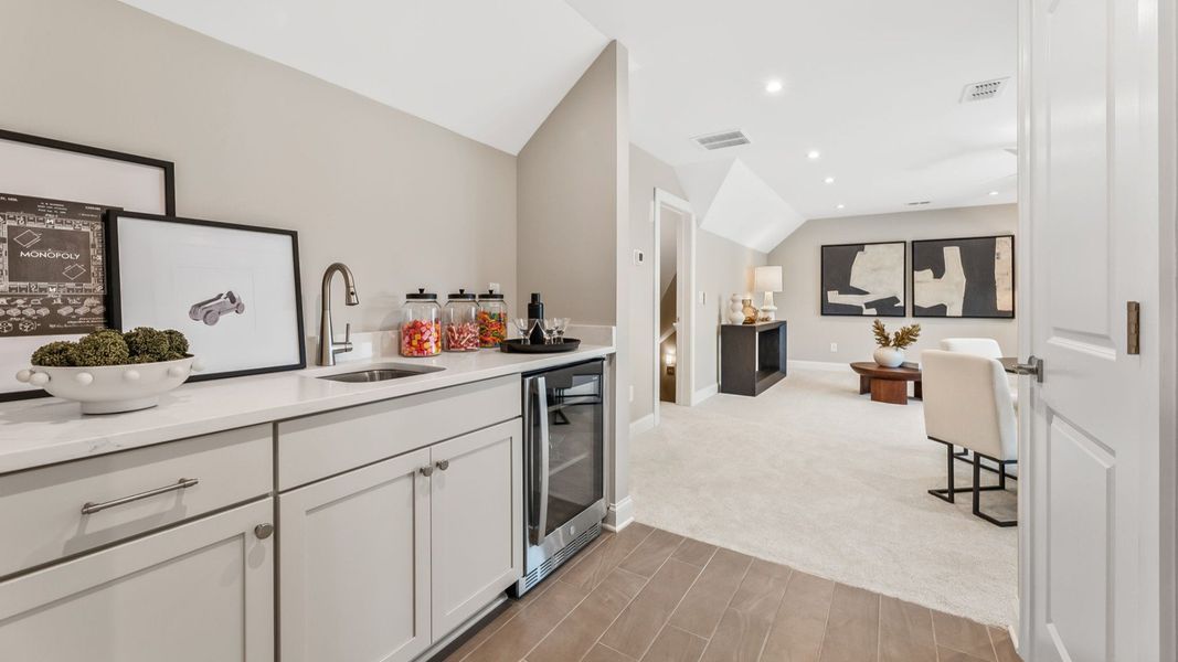 Furnished interior in a model home at The Courtyards at Post Road in Cumming (Image 11).