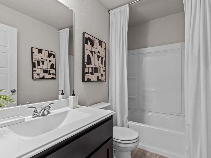 Furnished interior in a model home at Hannah Heights in Seguin (Image 17).