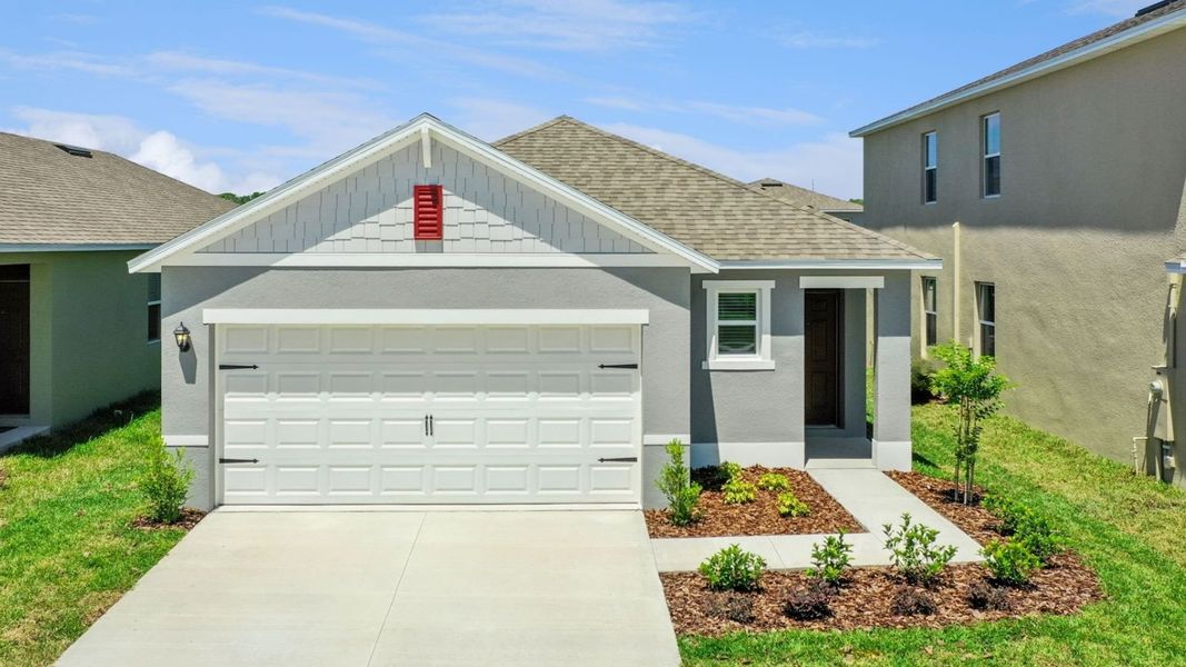 Front exterior of a home in the Wynwood community, located in Ocoee, FL (Image 4).
