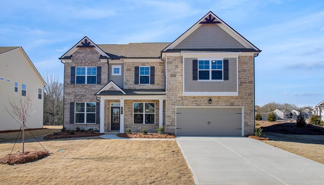 Front exterior of a home in the Ponderosa Farms Reserve community, located in Gainesville, GA (Image 22).