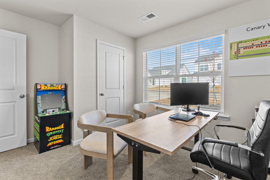 Furnished interior in a model home at Canary Woods in Hopkins (Image 22).