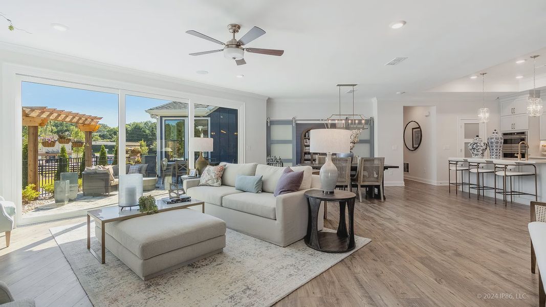 Furnished interior in a model home at The Courtyards at Redbud Lane in Holly Springs (Image 9).