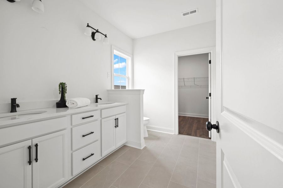 Furnished interior in a model home at Midtown Nexton/Piedmont in Summerville (Image 14). Furnished interior in a model home at Midtown Nexton/Piedmont in Summerville (Image 14).