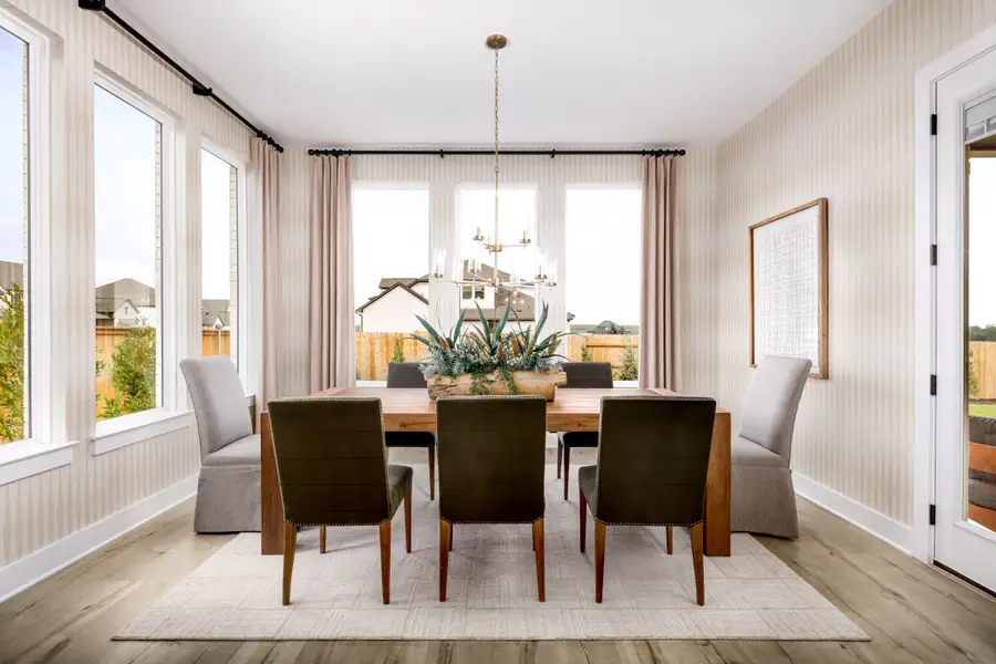 Furnished interior in a model home at 6 Creeks in Kyle (Image 29).