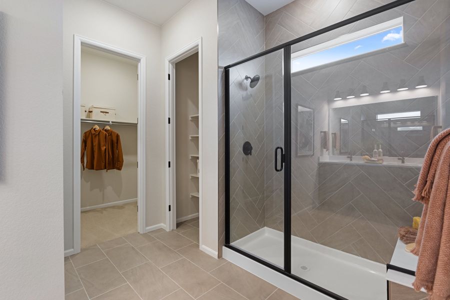 Furnished interior in a model home at The Estates Collection at Murphy Creek in Aurora (Image 23).