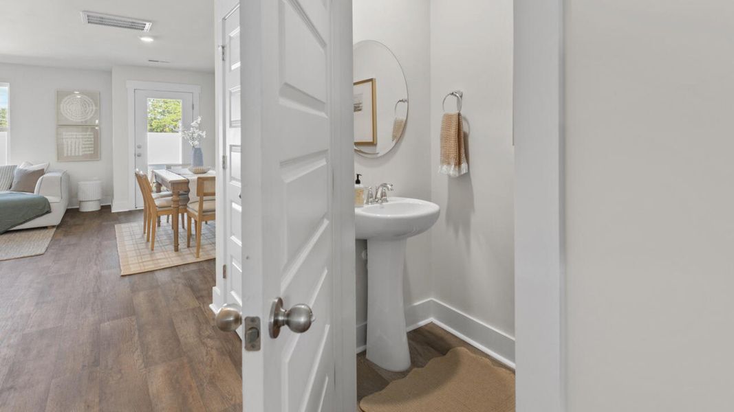 Furnished interior in a model home at Waterside Townhomes in Surf City (Image 19).