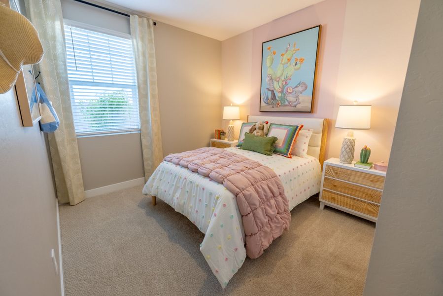 Furnished interior in a model home at Blossom Rock Reserve Series in Apache Junction (Image 29).