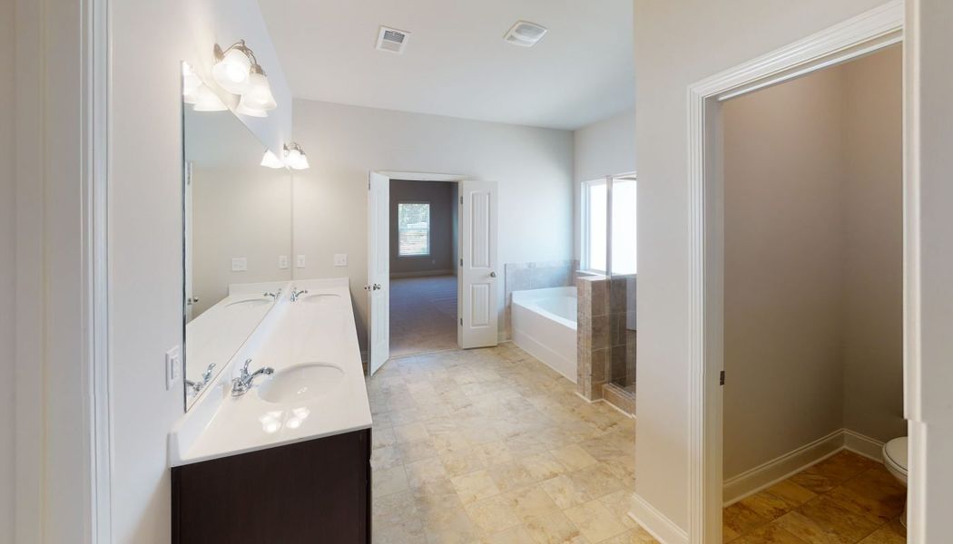 Image 31 of the Cove Lake Estates community in Conley, GA.