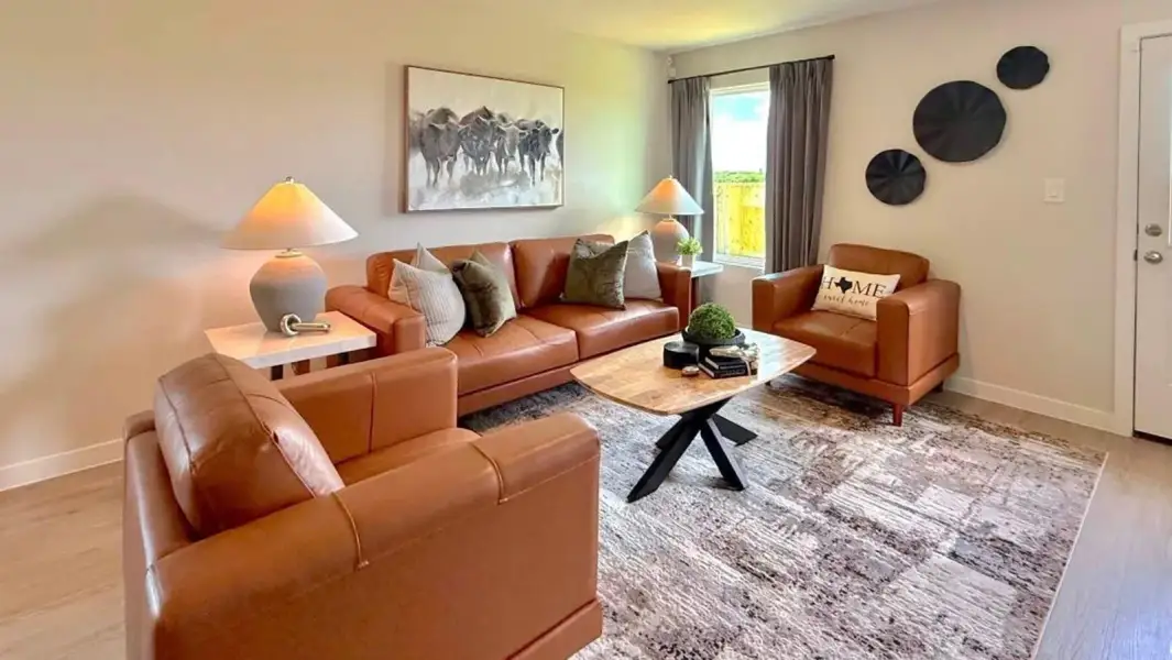Furnished interior in a model home at Flagstop Crossing in Odem (Image 5).