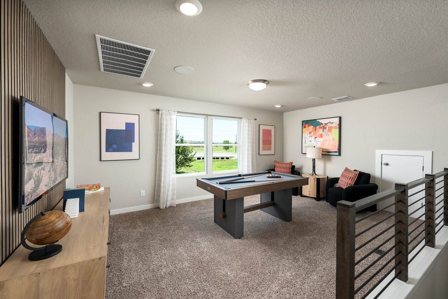 Furnished interior in a model home at August Fields in New Braunfels (Image 32).