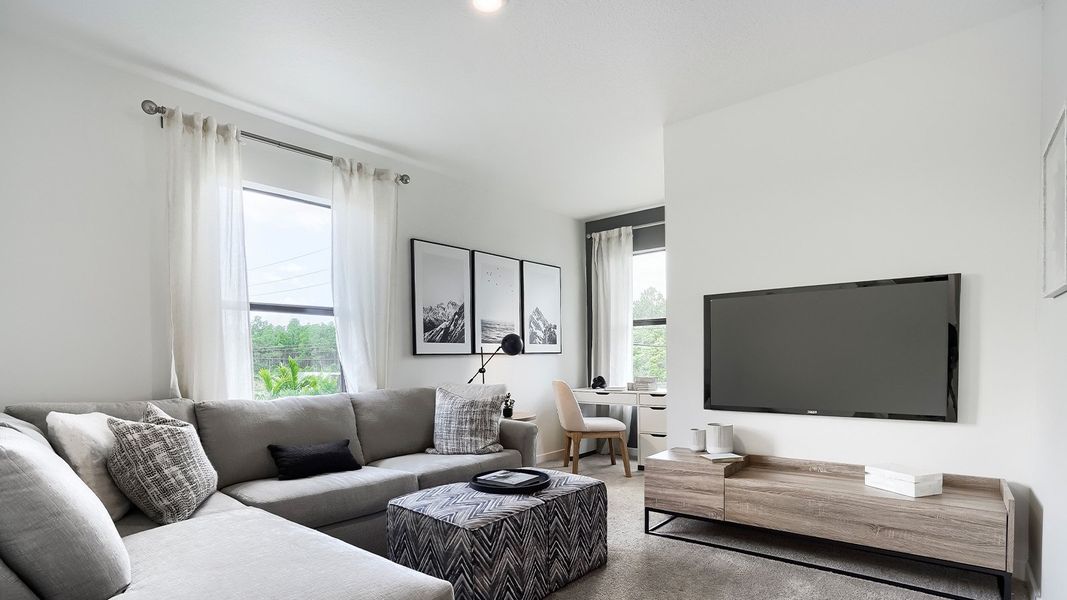 Furnished interior in a model home at Juniper Cove in Homestead (Image 10).