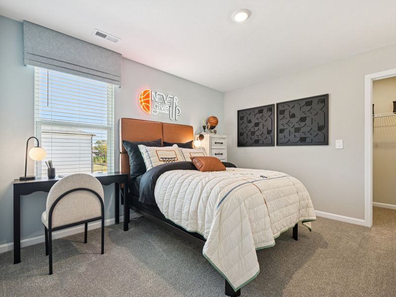 Secondary bedroom in the Johnson floorplan at a Meritage Homes community in Raleigh, NC. Secondary bedroom in the Johnson floorplan at a Meritage Homes community in Raleigh, NC.