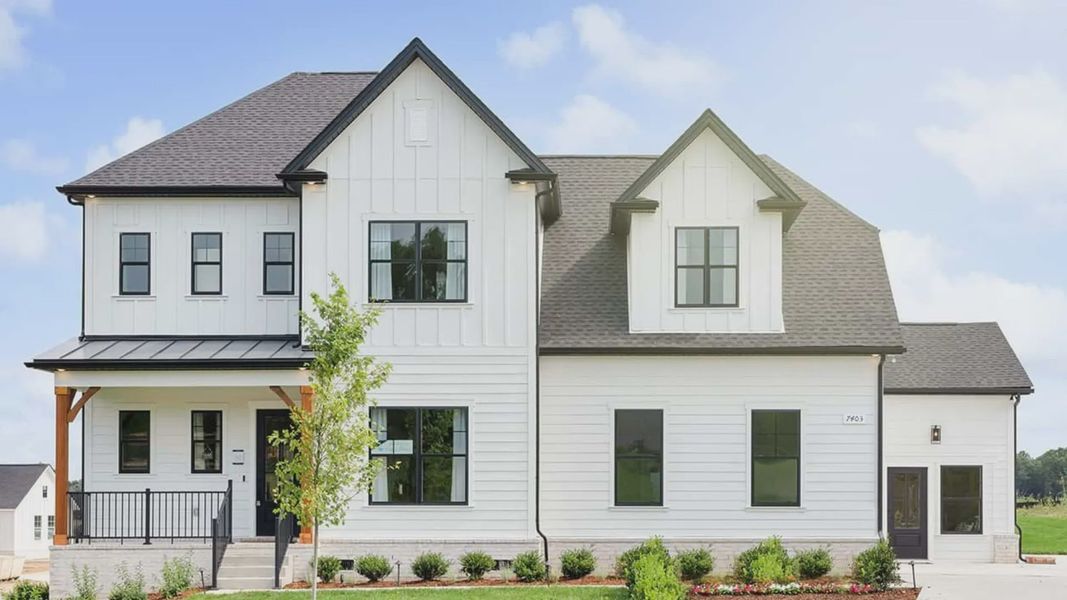 Enjoy timeless charm with this beautiful Farmhouse style home.