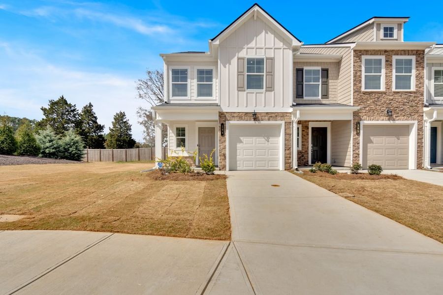 Front exterior of a home in the Village Green community, located in Adairsville, GA (Image 2). Front exterior of a home in the Village Green community, located in Adairsville, GA (Image 2).