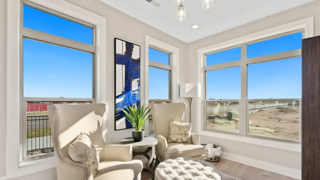 Furnished interior in a model home at The Courtyards at Lupton Village in Fort Lupton (Image 5).