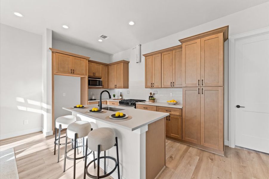 Furnished interior in a model home at Highland Gardens in Houston (Image 21).