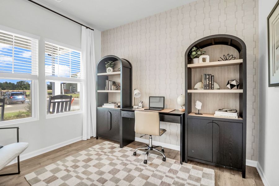 Furnished interior in a model home at Reeves Crossing in St. George (Image 19).