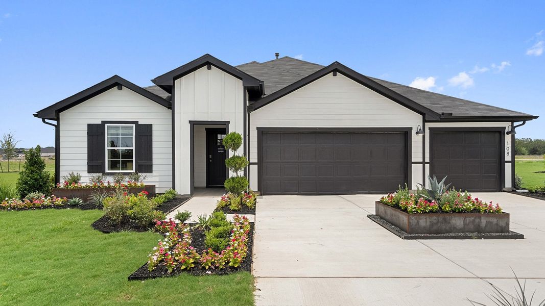 Front exterior of a home in the Railhead community, located in Cedar Creek, TX (Image 1).