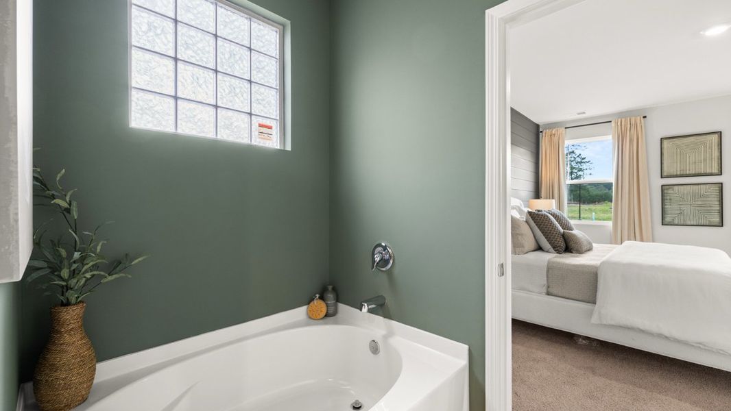 Furnished interior in a model home at Fairway 17 at Mirror Lake in Villa Rica (Image 34).