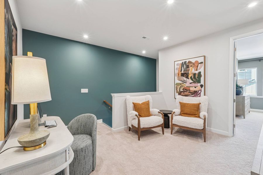 Furnished interior in a model home at Mews at Holding Village in Wake Forest (Image 55).