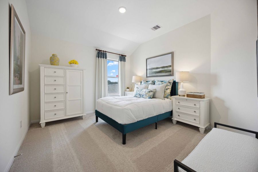 Furnished interior in a model home at Roman Forest in New Caney (Image 18).