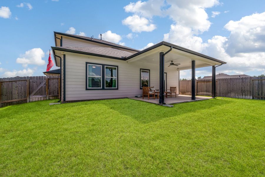 Front exterior of a home in the Magnolia Springs community, located in Montgomery, TX (Image 11).