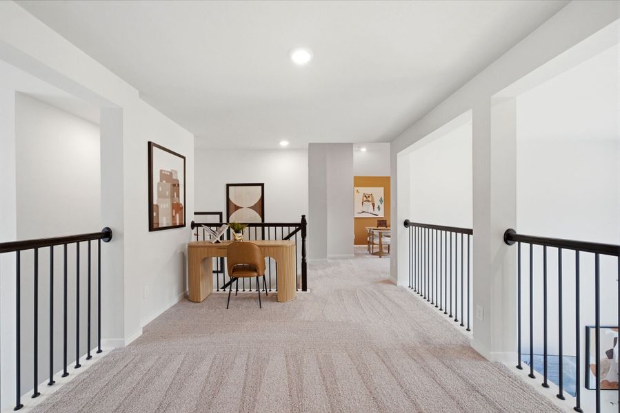 A room with a table and chairs.