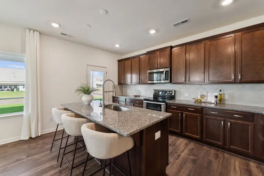 Furnished interior in a model home at Parks at Meadowview in Pittsboro (Image 2). Furnished interior in a model home at Parks at Meadowview in Pittsboro (Image 2).
