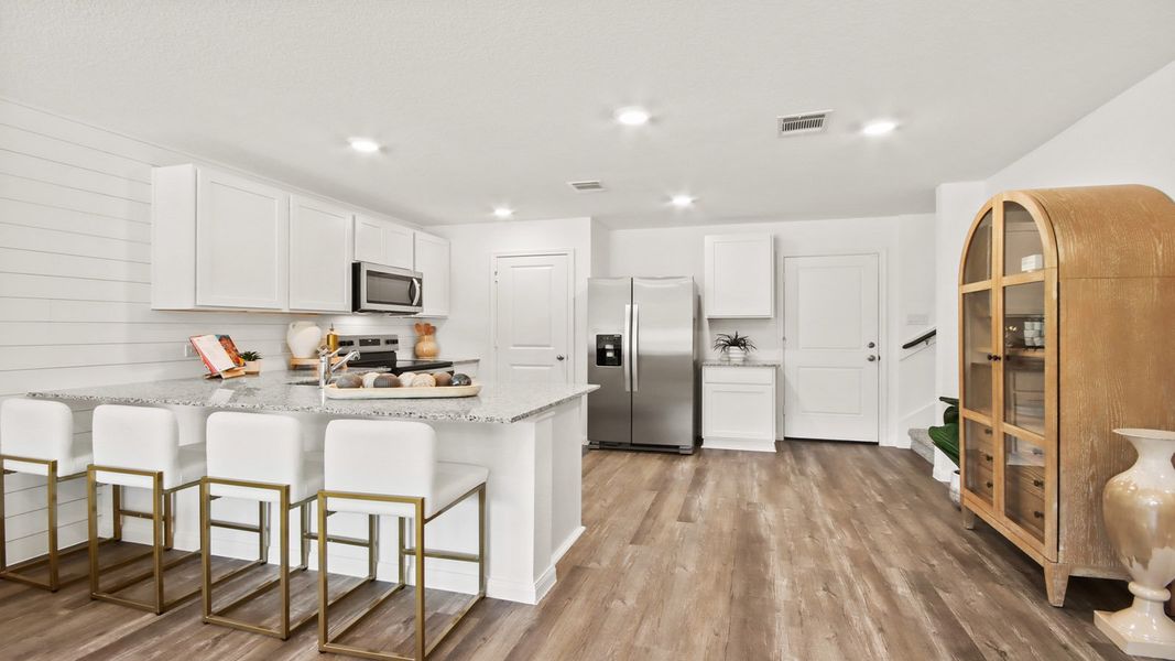 Furnished interior in a model home at Castles Edge in Willis (Image 5).