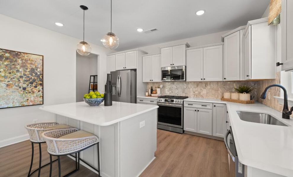Furnished interior in a model home at Hayes Village in Greensboro (Image 7).