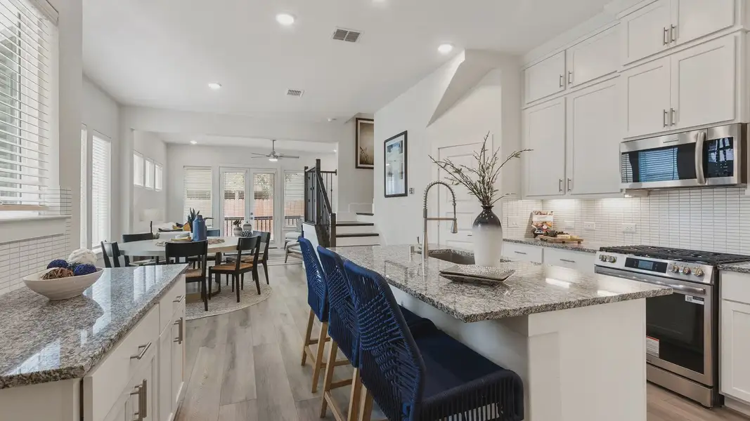 Furnished interior in a model home at Shady Acres in Houston (Image 6).