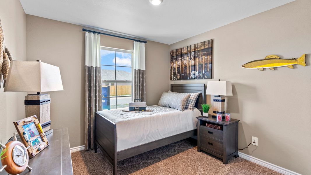 Furnished interior in a model home at The Cottages in Corpus Christi (Image 19).