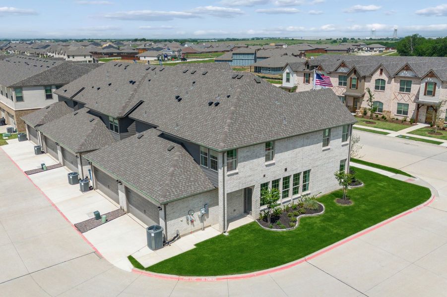 Front exterior of a home in the Sanger Circle – Townhomes community, located in Sanger, TX (Image 72). Front exterior of a home in the Sanger Circle – Townhomes community, located in Sanger, TX (Image 72).