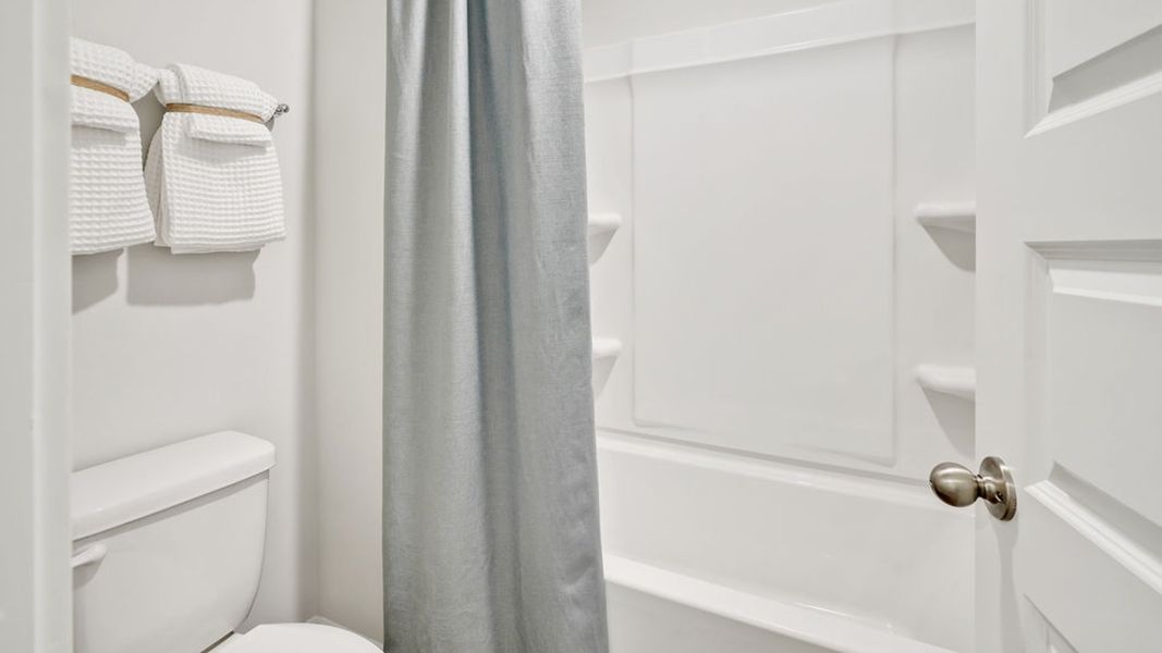 Furnished interior in a model home at Saltgrass Landing in Winnabow (Image 24).