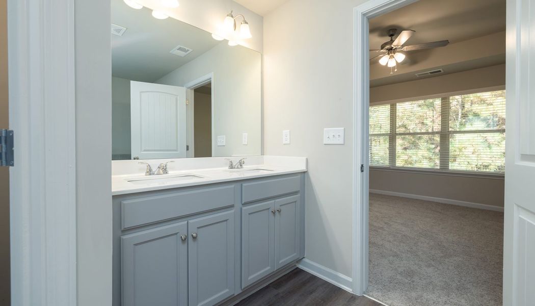 Furnished interior in a model home at The Reserve at Clocktower in Douglasville (Image 29).