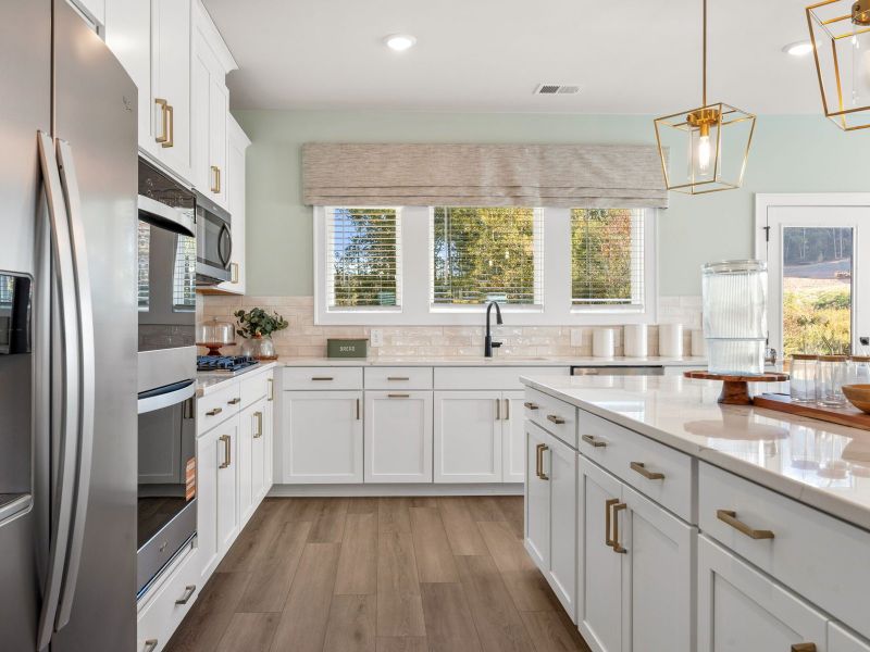 Furnished interior in a model home at Hemingway - Highland Series in Cumming (Image 20).