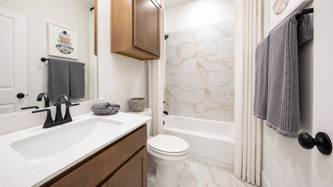 Furnished interior in a model home at Las Lomas in Forney (Image 21).