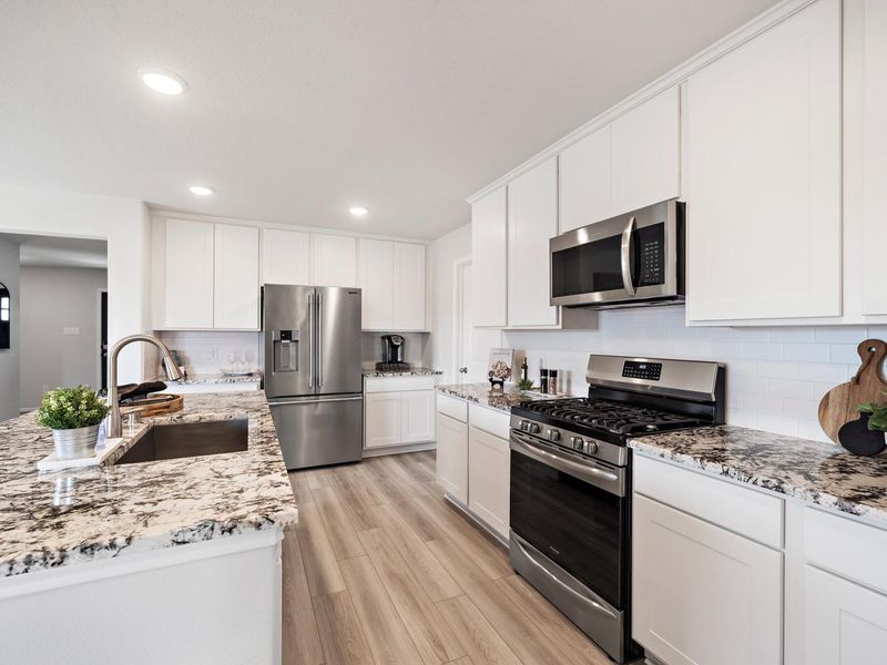 Furnished interior in a model home at Sunterra in Katy (Image 12).
